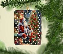 Load image into Gallery viewer, Cavalier Spaniel and Santa Claus Porcelain Ornament