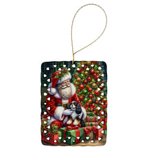 Load image into Gallery viewer, Cavalier Spaniel and Santa Claus Porcelain Ornament