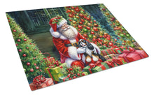 Load image into Gallery viewer, Cavalier Spaniel and Santa Claus Glass Cutting Boards – Durable, Decorative Kitchen Art
