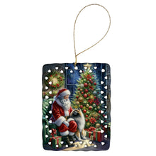 Load image into Gallery viewer, Keeshond and Santa Claus Porcelain Ornament