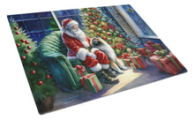 Load image into Gallery viewer, Keeshond and Santa Claus Glass Cutting Boards – Durable, Decorative Kitchen Art