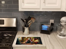 Load image into Gallery viewer, Labrador Retriever and Santa Claus Glass Cutting Boards – Durable, Decorative Kitchen Art
