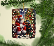 Load image into Gallery viewer, Rottweiler and Santa Claus Porcelain Ornament