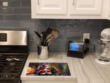 Load image into Gallery viewer, Rottweiler and Santa Claus Glass Cutting Boards – Durable, Decorative Kitchen Art