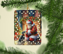Load image into Gallery viewer, Schnauzer and Santa Claus Porcelain Ornament