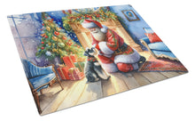 Load image into Gallery viewer, Schnauzer and Santa Claus Glass Cutting Boards – Durable, Decorative Kitchen Art