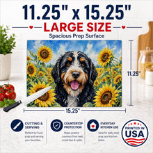 Load image into Gallery viewer, Bernedoodle in Sunflowers Cutting Board Tempered Glass Kitchen Cutting Surface, Heat Resistant Chopping Board with Non-Slip Feet, Decorative Food Prep &amp; Serving