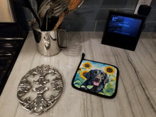 Load image into Gallery viewer, Flat-Coated Retriever in Sunflowers Pot Holders - Set of 2 Decorative Kitchen Helpers | Made in the USA