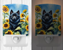 Load image into Gallery viewer, Schipperke in Sunflowers Ceramic Night Light