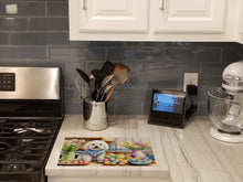 Load image into Gallery viewer, Decorating Easter Coton de Tulear Glass Cutting Boards – Durable, Decorative Kitchen Art