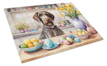 Load image into Gallery viewer, Decorating Easter German Wirehaired Pointer Glass Cutting Boards – Durable, Decorative Kitchen Art