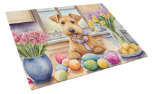 Load image into Gallery viewer, Decorating Easter Lakeland Terrier Glass Cutting Boards – Durable, Decorative Kitchen Art