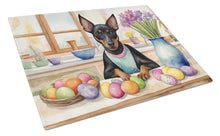 Load image into Gallery viewer, Decorating Easter Manchester Terrier Glass Cutting Boards – Durable, Decorative Kitchen Art