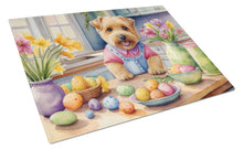 Load image into Gallery viewer, Decorating Easter Norfolk Terrier Glass Cutting Boards – Durable, Decorative Kitchen Art