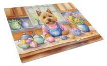 Load image into Gallery viewer, Decorating Easter Norwich Terrier Glass Cutting Boards – Durable, Decorative Kitchen Art