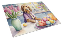 Load image into Gallery viewer, Decorating Easter Otterhound Glass Cutting Boards – Durable, Decorative Kitchen Art