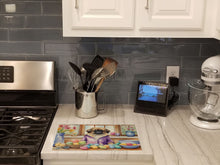 Load image into Gallery viewer, Decorating Easter Pekingese Glass Cutting Boards – Durable, Decorative Kitchen Art