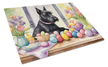 Load image into Gallery viewer, Decorating Easter Scottish Terrier Glass Cutting Boards – Durable, Decorative Kitchen Art