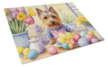 Load image into Gallery viewer, Decorating Easter Silky Terrier Glass Cutting Boards – Durable, Decorative Kitchen Art