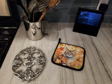 Load image into Gallery viewer, Dwelf Cat in Fall Leaves Pot Holders - Set of 2 Decorative Kitchen Helpers | Made in the USA