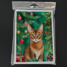 Load image into Gallery viewer, Abyssinian Cat By the Christmas Tree Greeting Cards - Blank Note Cards – 8-Pack of Artist-Designed Cards with Envelopes