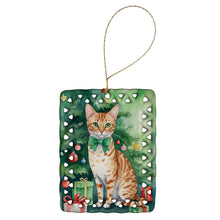 Load image into Gallery viewer, Ocicat Cat By the Christmas Tree Porcelain Ornament