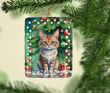Load image into Gallery viewer, Pixie Bob Cat By the Christmas Tree Porcelain Ornament