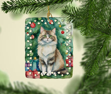Load image into Gallery viewer, Ragamuffin Cat By the Christmas Tree Porcelain Ornament