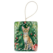 Load image into Gallery viewer, Savannah Cat By the Christmas Tree Porcelain Ornament
