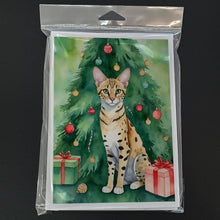 Load image into Gallery viewer, Savannah Cat By the Christmas Tree Greeting Cards - Blank Note Cards – 8-Pack of Artist-Designed Cards with Envelopes