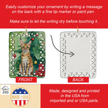 Load image into Gallery viewer, Serengeti Cat By the Christmas Tree Porcelain Ornament