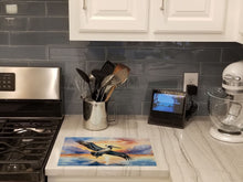 Load image into Gallery viewer, Pelican Fyling at Sunrise Glass Cutting Boards – Durable, Decorative Kitchen Art