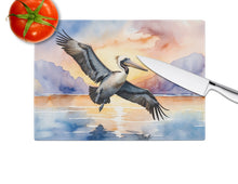 Load image into Gallery viewer, Pelican Fyling at Sunrise Glass Cutting Boards – Durable, Decorative Kitchen Art