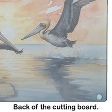 Load image into Gallery viewer, Pelicans Flying Glass Cutting Boards – Durable, Decorative Kitchen Art