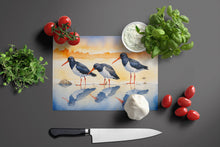 Load image into Gallery viewer, Oystercatchers Foraging Glass Cutting Boards – Durable, Decorative Kitchen Art