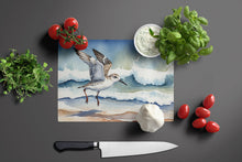 Load image into Gallery viewer, Sanderling Racing the Tide Glass Cutting Boards – Durable, Decorative Kitchen Art