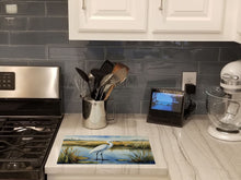 Load image into Gallery viewer, Snowy Egret in Coastal Marshes Glass Cutting Boards – Durable, Decorative Kitchen Art