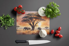 Load image into Gallery viewer, Elephants Savanna Sunrise Glass Cutting Boards – Durable, Decorative Kitchen Art