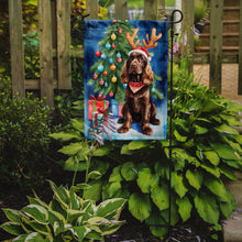Load image into Gallery viewer, Chocolate Cocker Spaniel Christmas Garden Flag – Dog in Reindeer Antlers with Tree &amp; Gifts