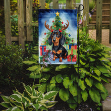 Load image into Gallery viewer, Black and Tan Dachshund Christmas Garden Flag – Dog in Reindeer Antlers with Tree &amp; Gifts