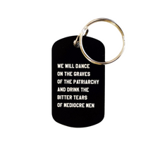Load image into Gallery viewer, Dance on the Graves of the Patriarchy Dog Tag Keychain in Black, Laser Engraved