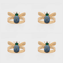 Load image into Gallery viewer, Etched wing bug skinny napkin rings, lapis lazuli, set of four