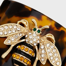 Load image into Gallery viewer, Stripey bee resin napkin rings, tortoiseshell, set of four