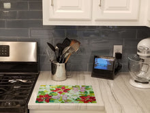Load image into Gallery viewer, Poinsettias by Ferris Hotard Glass Cutting Boards – Durable, Decorative Kitchen Art Large