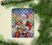Load image into Gallery viewer, Cocker Spaniel with Santa Claus Porcelain Ornament