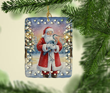 Load image into Gallery viewer, Blue Heron with Santa Claus Porcelain Ornament