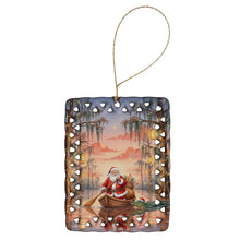 Load image into Gallery viewer, Cajun Santa Claus in the Pirogue Christmas Porcelain Ornament