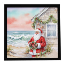 Load image into Gallery viewer, Santa Claus by the Seaside Cottage Christmas Framed Metal Print