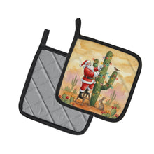 Load image into Gallery viewer, Santa Claus Decorating a Cactus Christmas Pair of Pot Holders