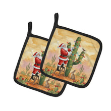 Load image into Gallery viewer, Santa Claus Decorating a Cactus Christmas Pair of Pot Holders
